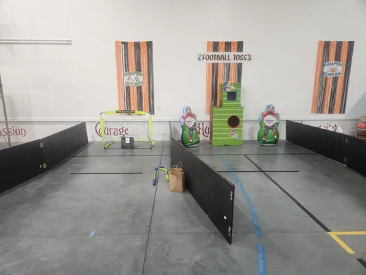 Bowling and football game booth at Harvest Festival
