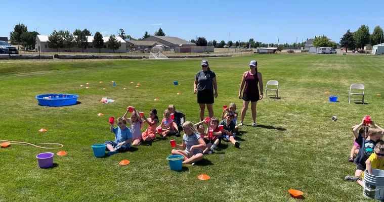 Youth participating in water wars activities