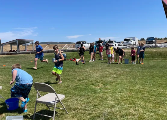 Water wars event with youth having fun